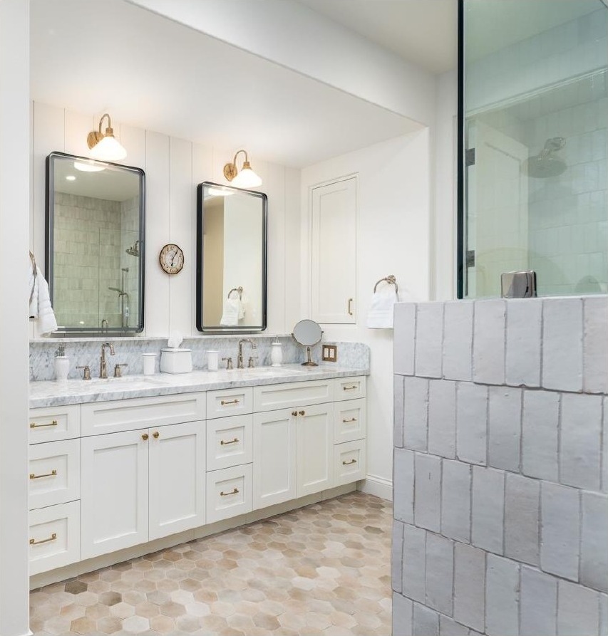 Guest house bathroom with double vanity and zellige tile shower